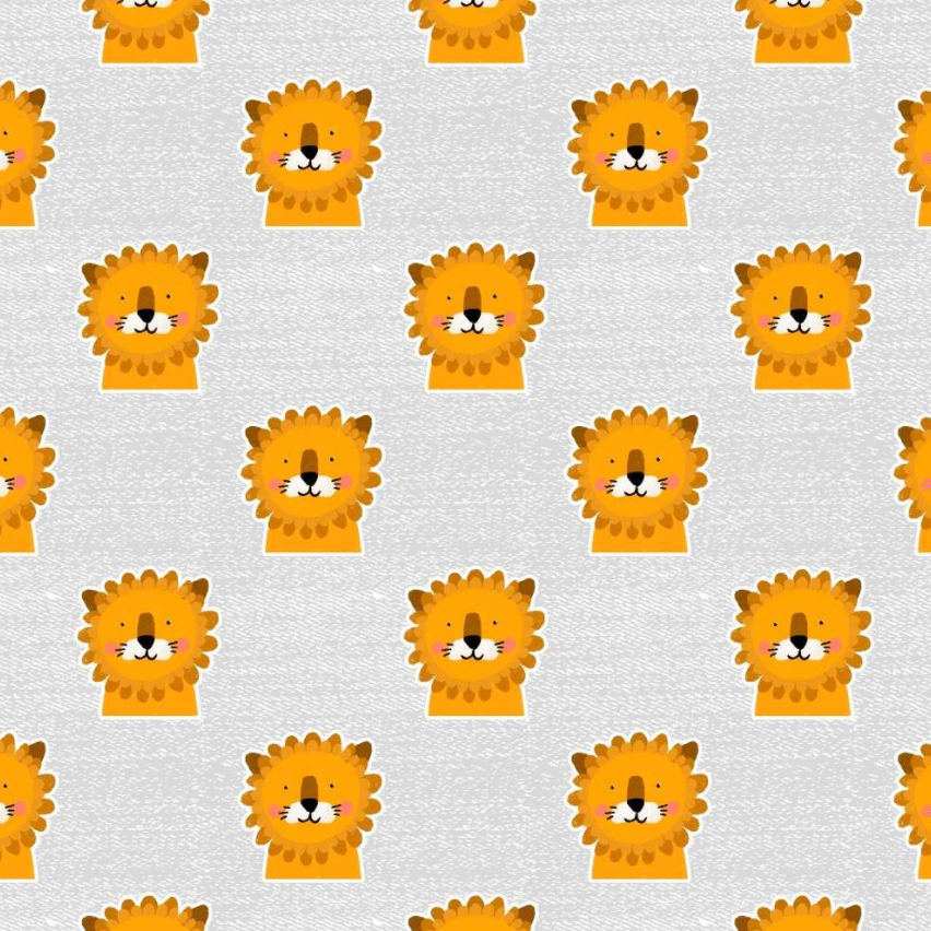 Stock photo of Lillestoff organic jersey knit fabric in Mr Leo design. Pale grey background with yellow/orange lion faces