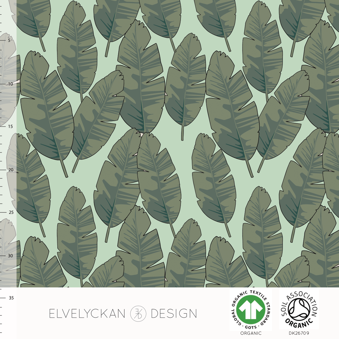 Elvelyckan banana leaf Neo Mint organic jersey cotton knit fabric.  With green banana leaves on a light green background