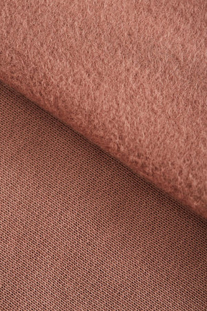 Close up of Mind the Maker Old Rose Organic Brushed Sweat fabric