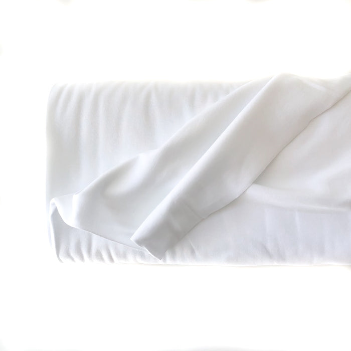 Swatch of Elvelyckan White Organic Cotton Jersey Rib Fabric. 